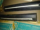 549537 General Motors Nos Grand Prix Pair Rear Bumper Guard Inserts