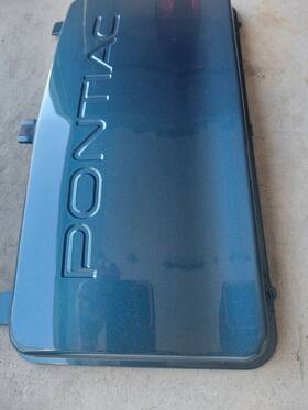 10251087 Pontiac 97 - 03 Grand Prix Front Bumper License Plate Cover Filler- Dk.teal