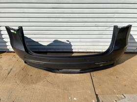 1540124-01-a Tesla 20-23 Model Y Rear Bumper Cover With Lower Valance Gray Oem