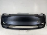 2022-2023 Tesla Model Y Front Bumper Cover W/o Sensor Holes Oem. Fixed Price $300.00.