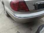 1998-1999-2000-2001-2002 Lincoln Continental Left Rear Bumper Chrome Molding. Fixed Price $75.00.