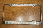 Vintage Happiness Is Being Grandparent License Plate Frame Hearts Metal. Fixed Price $18.95.