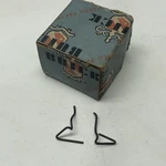 Nos 1942-49 Buick Bumper Guard Emblem Retainer Clips 1331658 Z2. Fixed Price $13.95.