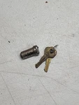 Vintage Studebaker Lock Cylinder With 2 Keys Flip Top. Fixed Price $31.50.