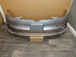 2021 - 2025 Tesla Model Oem Front Bumper Cover W/ Tag Holder No Sensor Hole. Fixed Price $400.00.
