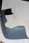 Rear Bumper Trim Primed For Bmw 3 Series E-46. Fixed Price $399.00.