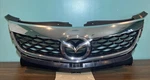 2010-2012 Mazda CX-9 Front Upper Grille W/ Emblem Oem Z8563 Dg. Fixed Price $225.00.