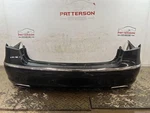 12-14 Hyundai Genesis Sedan Rear Bumper W/ Park Assist Caspian Black YB6. Fixed Price $300.00.