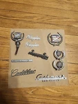Used 90 - 92 Cadillac Brougham Hood Ornament Trunk Emblem Chrome Set. Fixed Price $400.00.