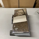Nos Oldsmobile 74-75 Front Bumper Center License Plate Support. Fixed Price $300.00.