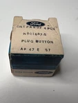 Nos Ford Plug Buttons (4X) N801687-S. Fixed Price $14.99.
