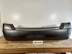 2004-2005 Chevrolet Malibu Rear Bumper Cover Oem. Fixed Price $190.00.