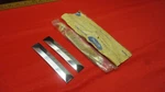 1974 1975 Ford Mustang 11 Front Bumper Guards Insert Molding Trim Nos. Fixed Price $109.95.