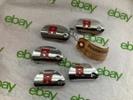 Nos Oem 1949 Ford 8A-7043514-A Trunk Lock Keyhole Cover Sold As Each. Fixed Price $29.00.