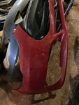 Tesla Model Front Bumper Cover 2012-2015 6005889-00-F Red With Torn Tabs. Fixed Price $420.00.
