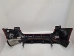 2011 - 2017 Jeep Grand Cherokee Rear Bumper Painted Upper With Textured Lower. Fixed Price $795.54.