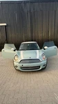 2006-2015 Mini Cooper Tow Hook Cover 51125A5F093. Fixed Price $59.00.